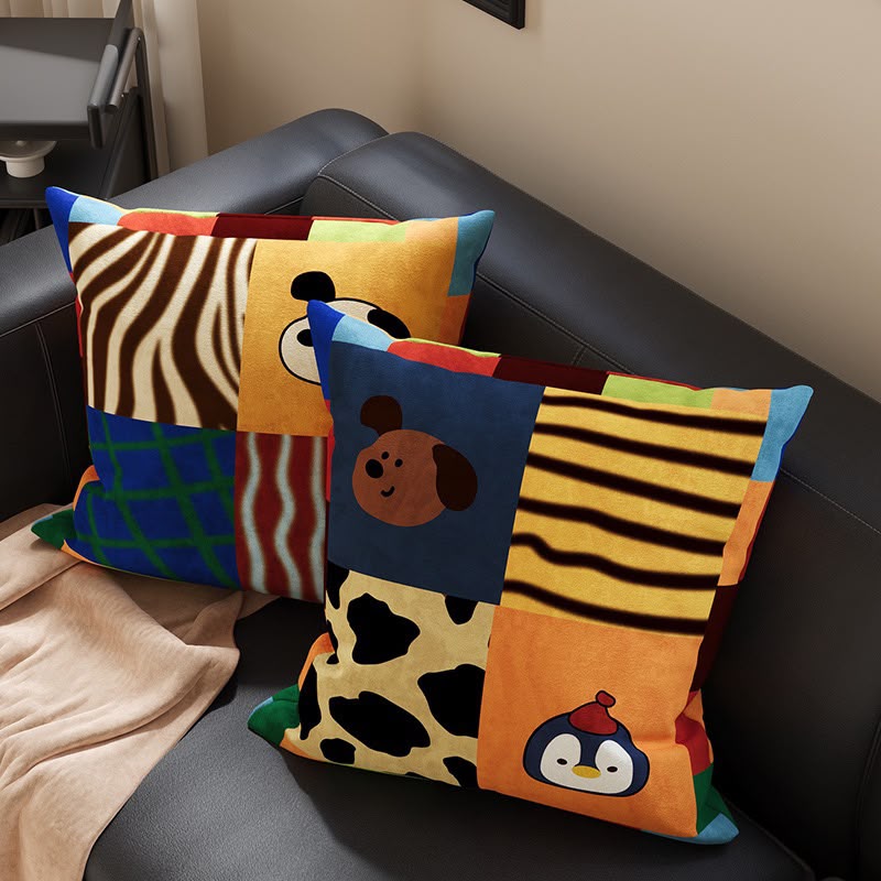 Quinn Patchwork Grid Pup Cushion on a sofa with the matching patchwork cushion