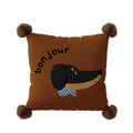 Elodie Bonjour Dachshund Cushion, brown cushion with a dachshund face and striped scarf, pom-pom corners