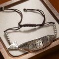 Delphine articulated fish charm cord bracelet
