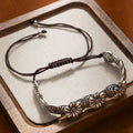 Lavinia carved daisy bead cord bracelet