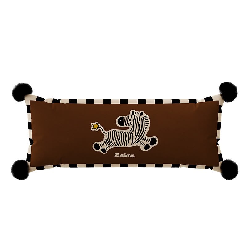 Romy Zebra Stripe Bolster Cushion, long brown cushion with a zebra print, striped border and black pom-pom corners