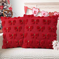 Ruby Red Plush Bow Cushion, red cover with tufted bows and gold heart centres