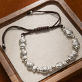 Elodie fish and silver bead cord bracelet