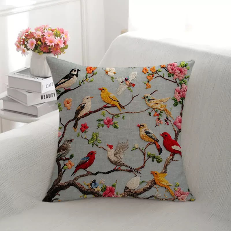 Lark Blossom Branch Birds Cushion, grey-blue cover with birds perched on blossom branches