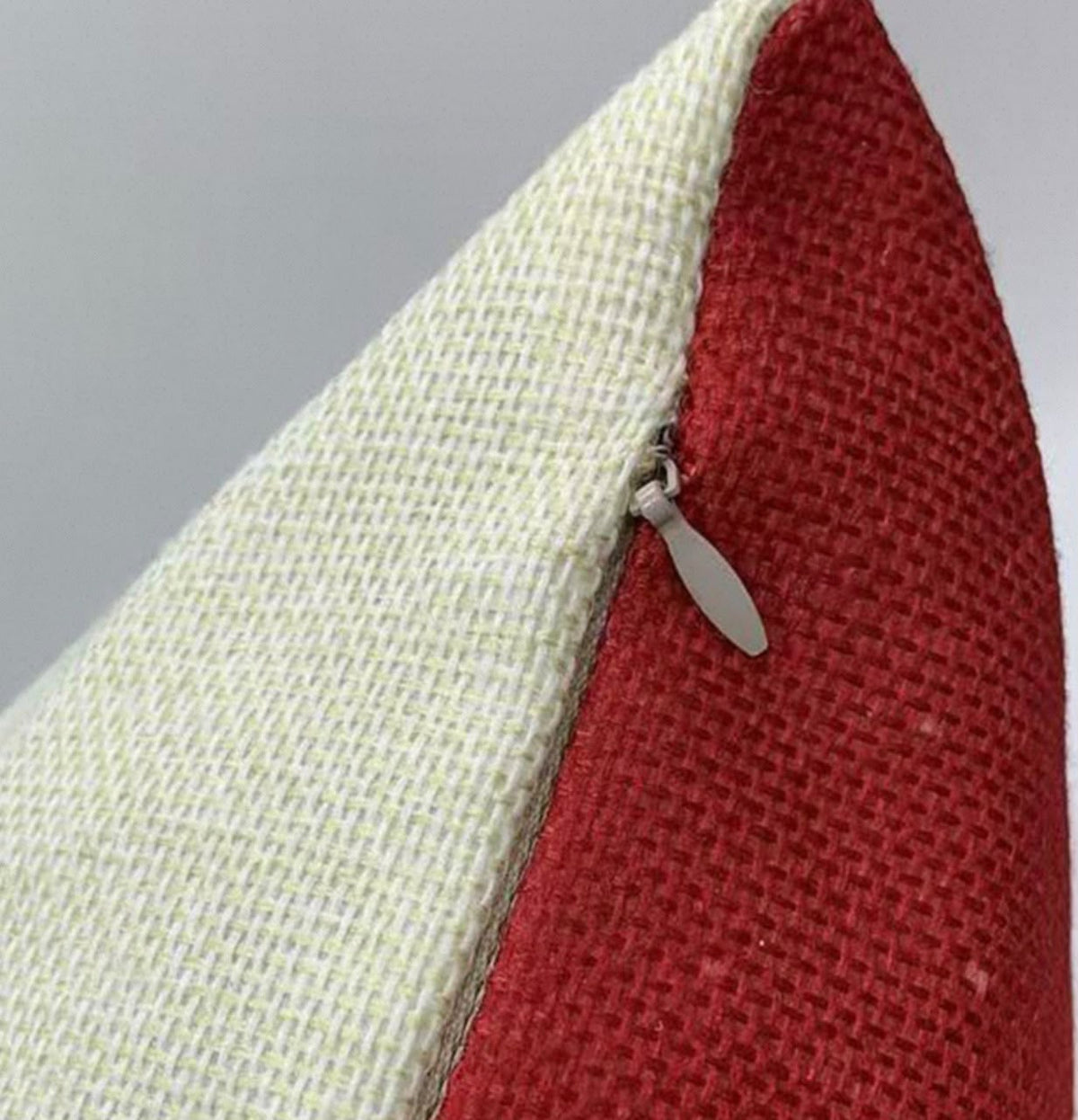 Close-up of the linen weave and concealed zip on the cushion cover