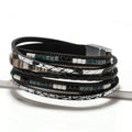 Constance black snake leather wrap bracelet — layered black and silver snake-print leather strands with beads and a magnetic clasp