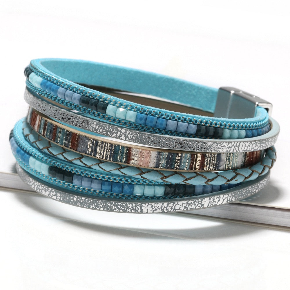Marjorie turquoise leather wrap bracelet — layered turquoise leather, silver print, braid and blue bead strands with a magnetic clasp