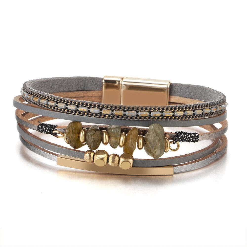 Nora moss stone chip leather bracelet — layered grey and tan leather strands with grey-green stone chips, gold-tone bar and magnetic clasp