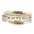 Primrose white stone chip leather bracelet — layered cream and white leather strands with white stone chips, gold-tone bar and magnetic clasp