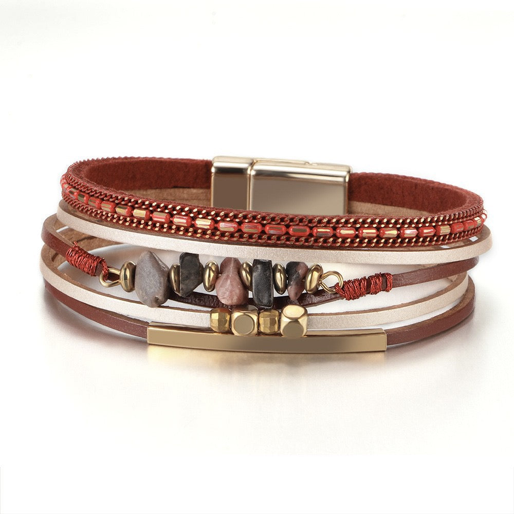 Iris rose stone chip leather bracelet — layered red and cream leather strands with pink and red stone chips, gold-tone bar and magnetic clasp