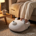 Polar bear electric foot warmer in use