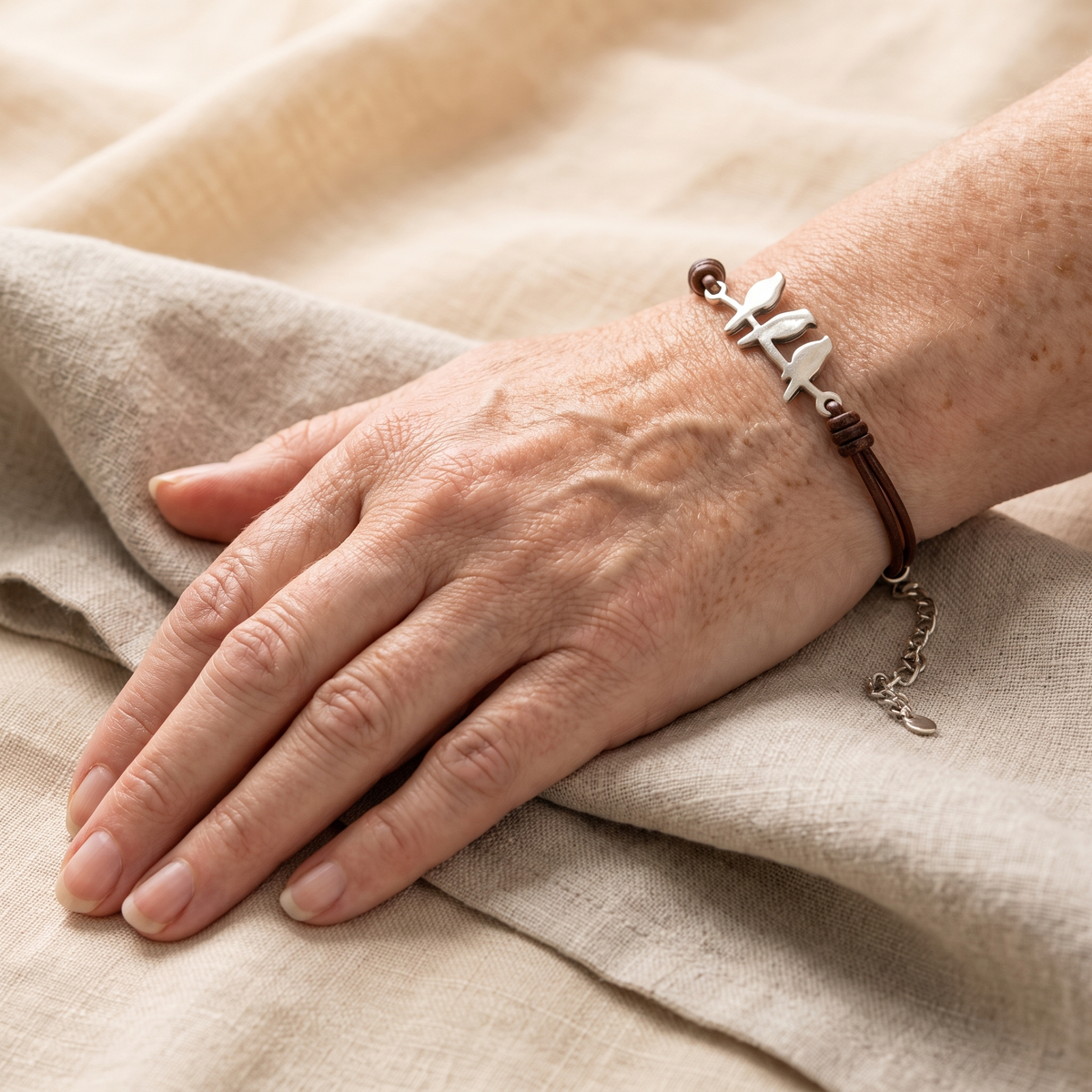 Bird Branch Leather Bracelet worn on the wrist
