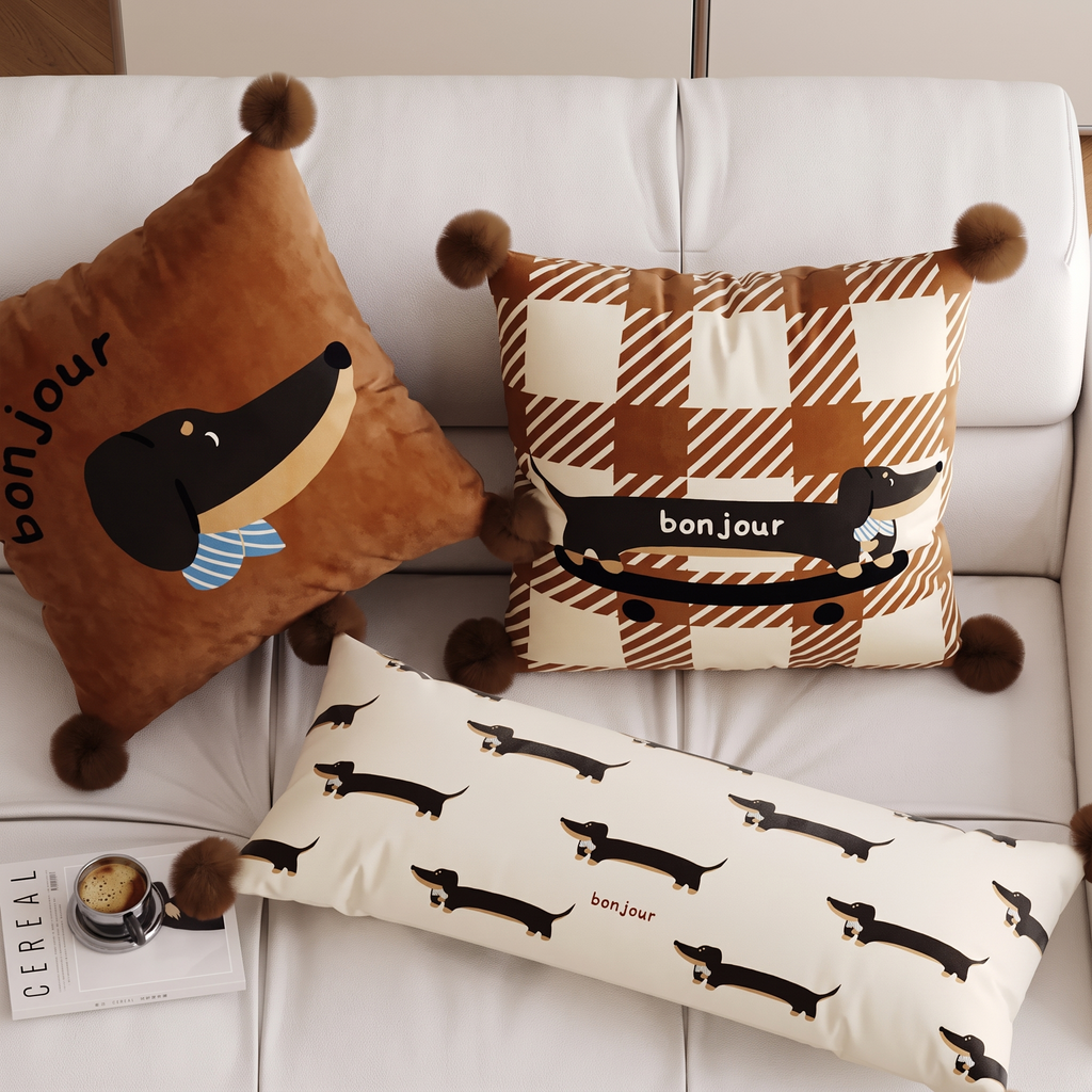 Bonjour dachshund cushion set on a cream sofa