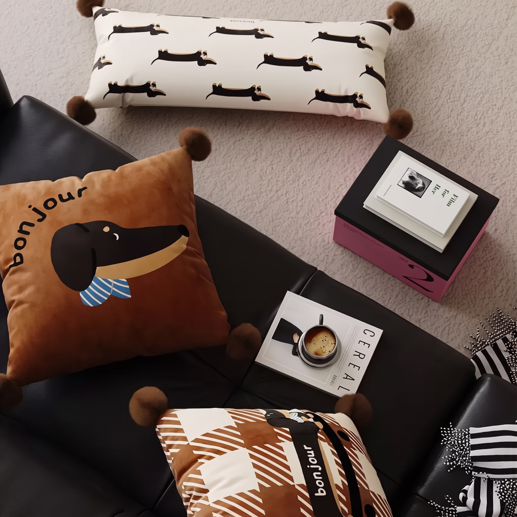Bonjour dachshund cushions grouped on a sofa