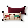 Odile Two Horse Bolster Cushion, long cream check cushion with two facing horses and a burgundy back